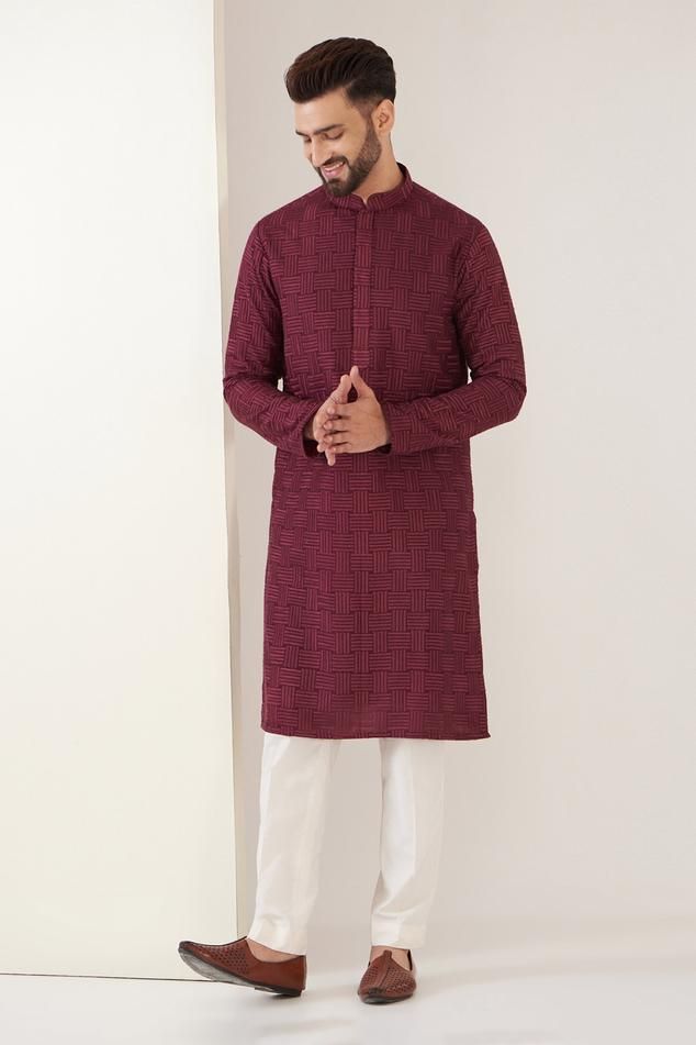 man wearing maroon kurta with white pajama